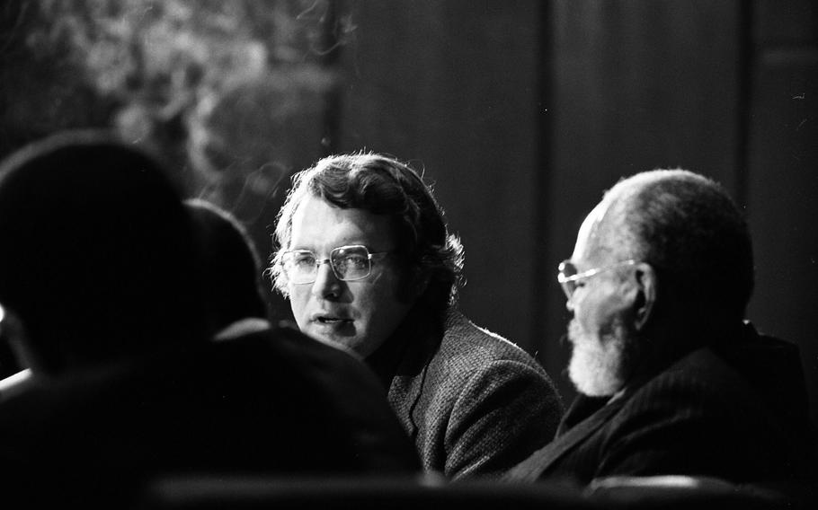 Moderator Gary Stevens poses a question to authors Chester Himes and James Baldwin at the “Black Literature Night” and “Discussion of the Racial Situation in America and Europe” at the Liederhalle in Stuttgart, Feb. 16, 1973. Himes’ “Black on Black,” a collection of short stories, essays and a film scenario was published the same month. 