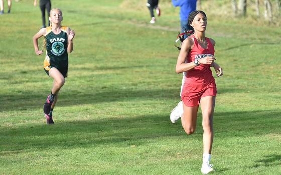 Kaiserslautern runner Samantha Ramsey leads SHAPE's Iveta Stefancinova to the line during an Oct. 14, 2023, race at Rolling Hills Golf Course at Baumholder, Germany. Ramsey held off Stefancinova to win the girls race in a time of 21:24.