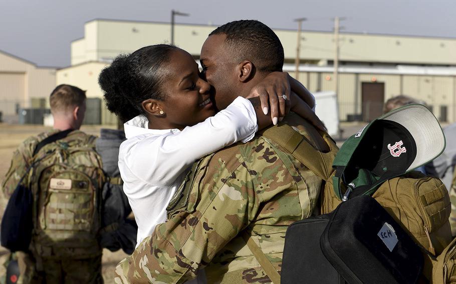 A U.S. airman hugs his spouse at Dyess Air Force Base, Texas, Jan. 18, 2019, after returning from a deployment.