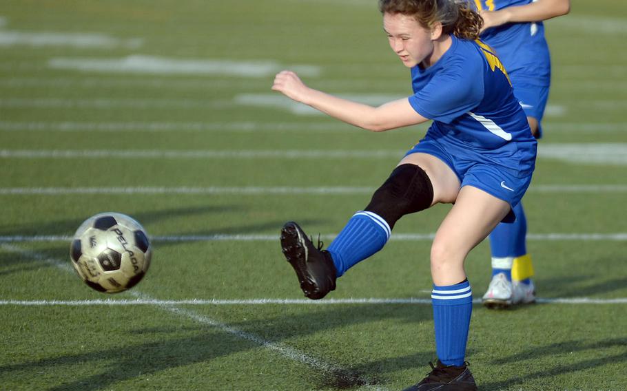 Yokota's Hailey Riddels launches a shot for a goal at the Matthew C. Perry net during Friday's All-DODEA-Japan soccer tournament quarterfinal. The Panthers outlasted the Samurai 4-3.