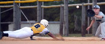 Kubasaki's Andrew Welte awaits a pickoff throw that catches Kadena's Alex Richardson straying too far off first base during Monday's Okinawa baseball game. The Panthers won 9-8, then lost to the Dragons 15-10 on Wednesday.