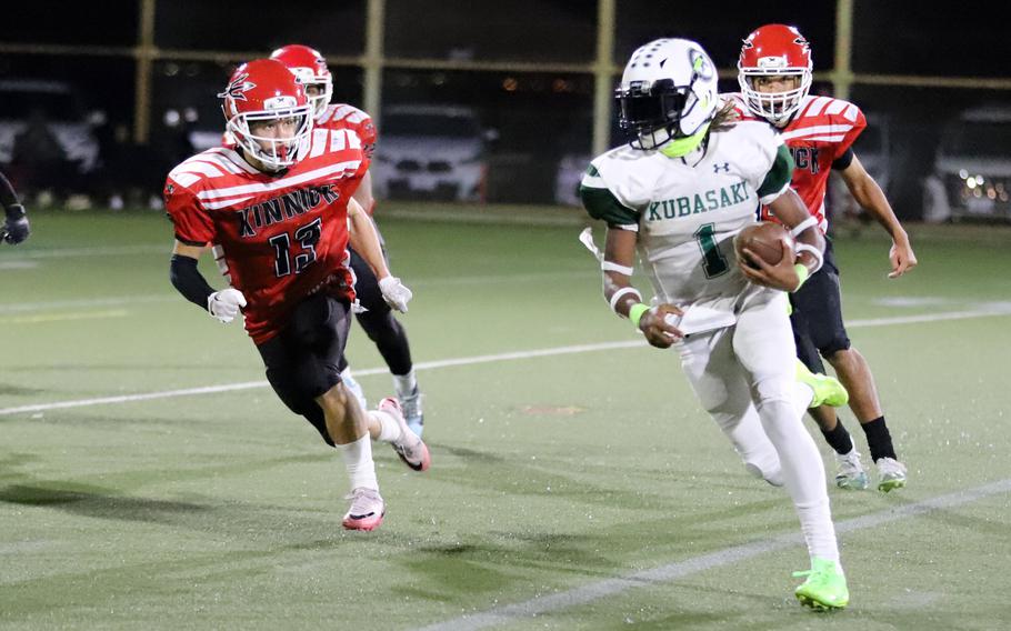 Carlos Cadet runs with the football.