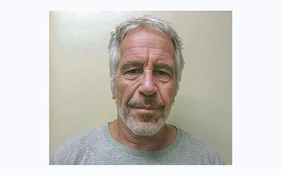 A police booking photo shows Jeffrey Epstein. 
