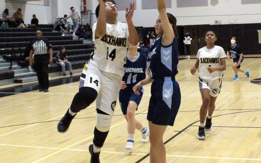 Humphreys' Stephanie Gabriel shoots against Chadwickl during Wednesday's Korea girls basketball game. The Blackhawks won 55-9.