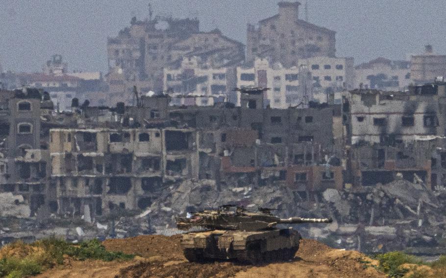 An Israeli tank positioned on the border with Gaza Strip in southern Israel on March 19, 2024.