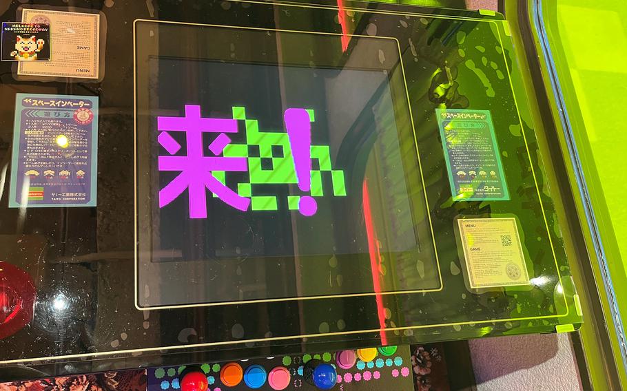 Tables double as retro arcade machines at Coffee Zingaro in Tokyo's Nakano Broadway. 