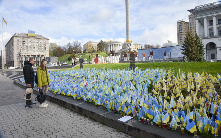 Small flags commemorate Ukrainian soldiers killed after Russia’s invasion of the country in February in the Maidan Nezalezhnosti, the central square of Kyiv, the country’s capital, on Oct. 26, 2022.