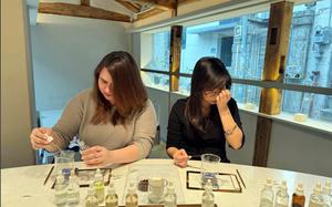 Guests create personalized fragrances during a perfume-making class at Proust Scent in Seoul, South Korea, July 1, 2025. 
