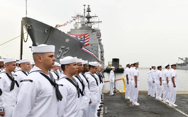 SAN DIEGO (Sept. 22, 2023) – The crew of the Ticonderoga class guided-missile cruiser USS Bunker Hill (CG 52) stand at attention during the ship’s decommissioning ceremony. Bunker Hill was decommissioned after more than 37 years of distinguished service. Commissioned Sept. 20, 1986, Bunker Hill served in the U.S. Pacific Fleet and supported Operation Desert Shield, Operation Desert Storm, and participated in the establishment of Operation Southern Watch. (U.S. Navy photo by Mass Communication Specialist 2nd Class Claire M. DuBois)