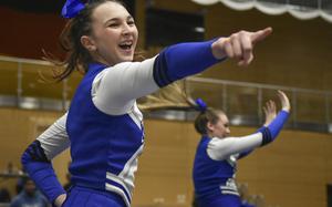 Lucia Martinez, a junior from Brussels, Belgium, shows spirit during the 2024 DODEA-Europe Cheerleading Championships in Wiesbaden, Germany on Friday, Feb. 16, 2024.

Brad Latham/Stars and Stripes