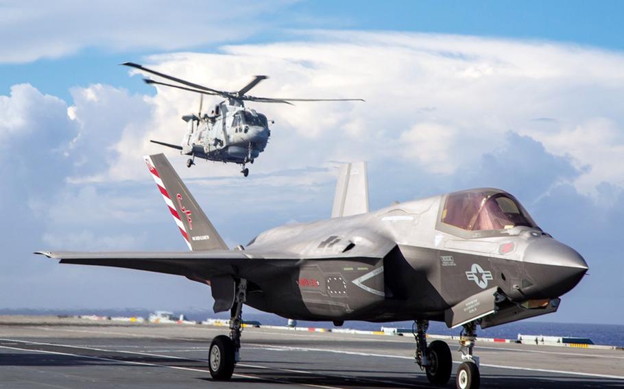 A U.S. Marine Corps F-35B Lightning II stealth fighter prepares to launch from the HMS Queen Elizabeth on the Pacific Ocean on Aug. 20, 2021. 