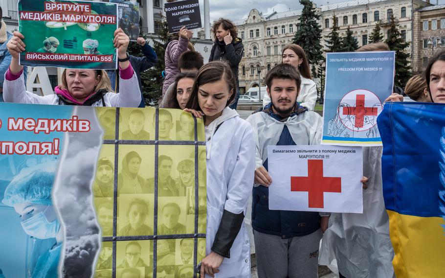 Family members of military medics taken prisoners by Russia participate in the larger demonstration of family members of prisoners demanding their release on the Independence Square in Kyiv on Sept. 24, 2022.