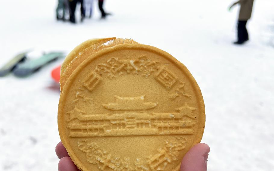 Crepes and Fast Foods at Fujiten Snow Resort serves a popular cheese bread shaped like a 10 yen coin for 500 yen.