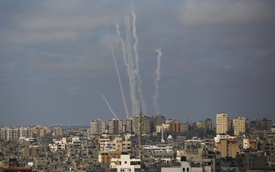 In this May 20, 2021 file photo, rockets are launched from the Gaza Strip towards Israel, in Gaza City.