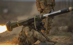 A soldier from the Idaho Army National Guard fires a Javelin anti-tank missile at the Orchard Combat Training Center ranges in Idaho, March 27, 2022.