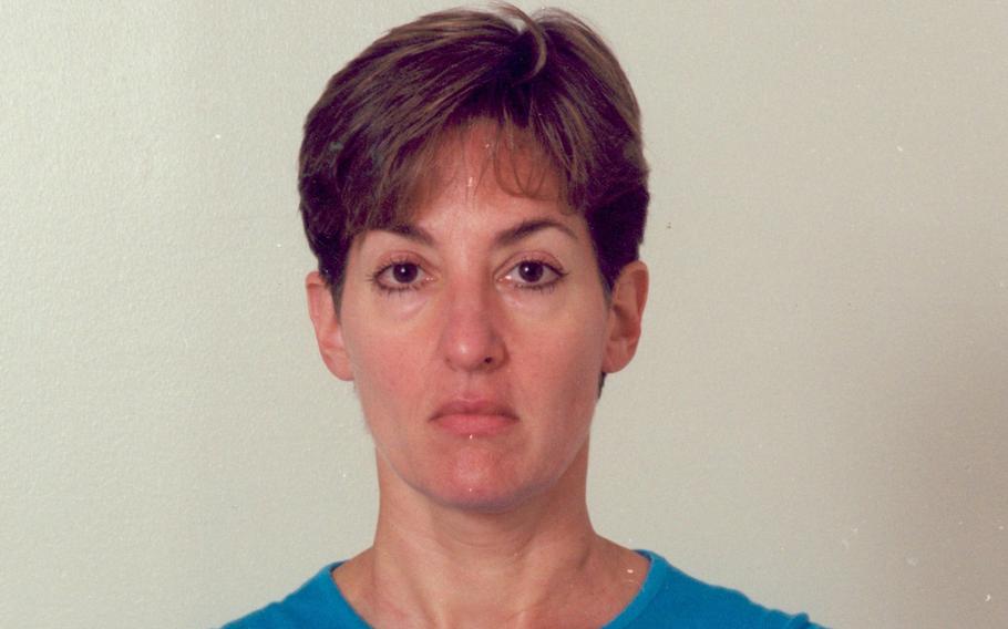 An undated mugshot of Ana Montes. On Sept. 21, 2001, Montes was arrested at DIA headquarters and escorted out of the building in handcuffs. 
