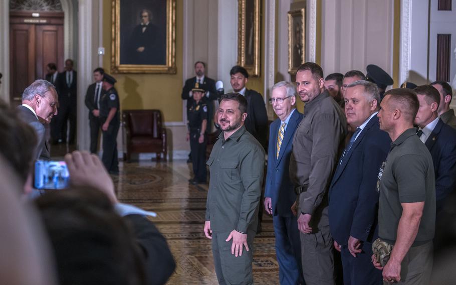 Ukraine President Volodymyr Zelenskyy stops for a moment to say a few words after leaving the Senate Chamber on Sept. 21, 2023, on Capitol Hill in Washington.