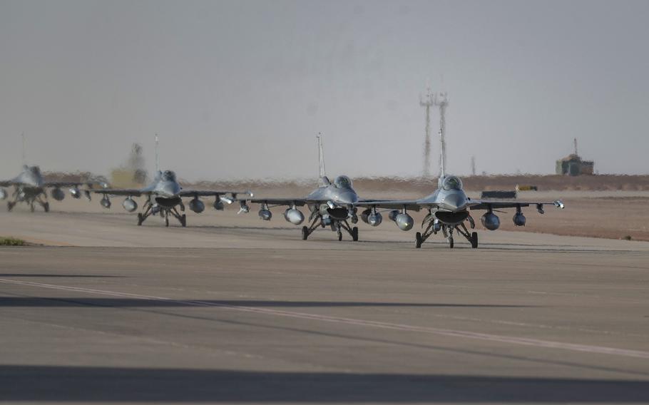U.S. Air Force F-16 Fighting Falcons from Aviano Air Base, Italy, taxi on the flight line at an air base in U.S. Central Command's area of responsibility, April 23, 2024, after arriving from Italy. 