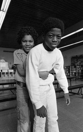J.T. Williams III, 9 (left) demonstrates how he saved his classmate Derek Dixon, 9 from choking,  by performing the Heimlich Maneuver. 