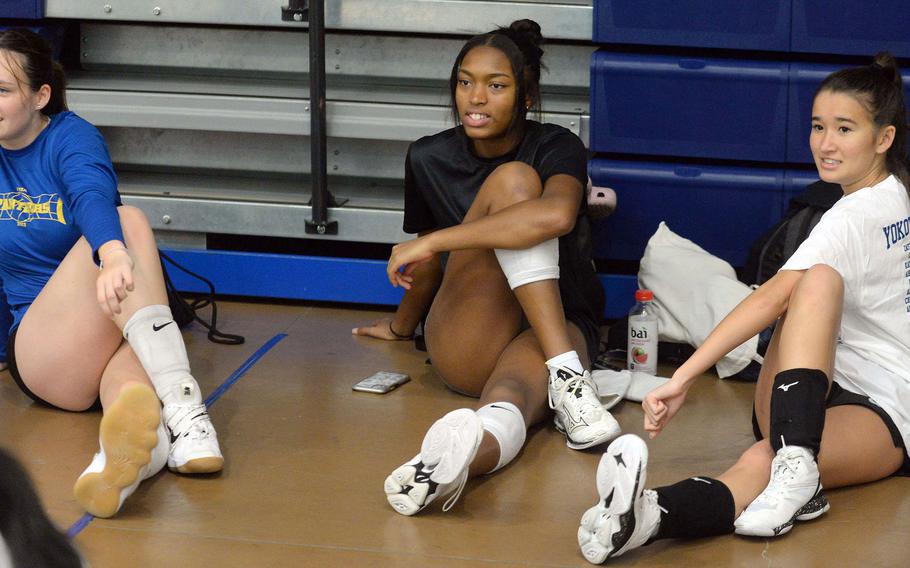 Seniors Malia Hutchins and Trinity Stegall and junior Erica Haas are three key returning starters for Yokota's volleyball team.