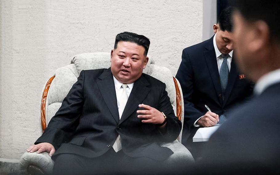 North Korean leader Kim Jong Un gestures while speaking to Russian Minister of Natural Resources and Ecology Alexander Kozlov, not pictured, after crossing the border to Russia at Khasan on Sept. 12, 2023.