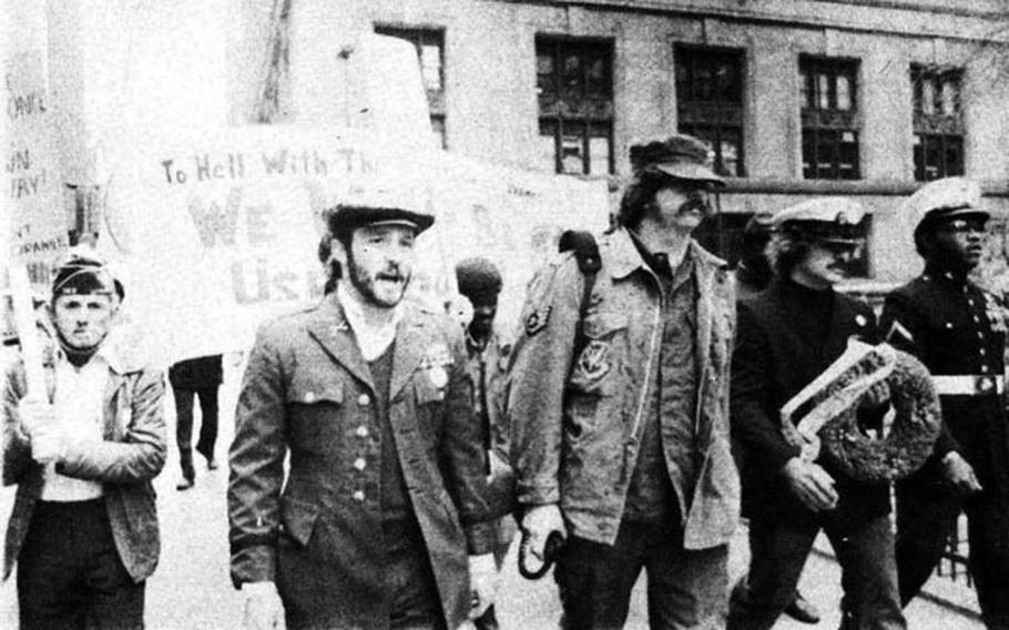 Barry Romo, second from left, and Bill Davis in Chicago marching with Vietnam Veterans Against the War on Veterans Day circa 1970. 