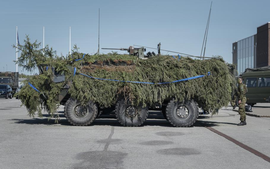 Military equipment camouflaged for the training exercise. NATO has begun pre-positioning more hardware on its eastern flank. 