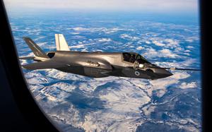 A British air force F-35B Lightning receives fuel from a tanker aircraft over Alaska in May 2023. Prime Minister Keir Starmer said Wednesday that the U.K. is going to purchase 12 F-35As, which can be equipped with nuclear bombs, and join NATO's nuclear mission.