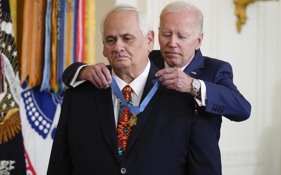 President Joe Biden on Tuesday, July 5, 2022, awards the Medal of Honor to Spc. Dwight Birdwell during a ceremony in the East Room of the White House in Washington. Birdwell received the award for his actions on Jan. 31, 1968, during the Vietnam War. 
