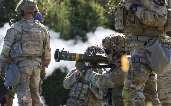U.S. soldiers from 5th Battalion, 20th Infantry Regiment fire an AT4 anti-tank weapon during Orient Shield at Kamifurano Training Area, Japan, Sept. 14, 2023. 