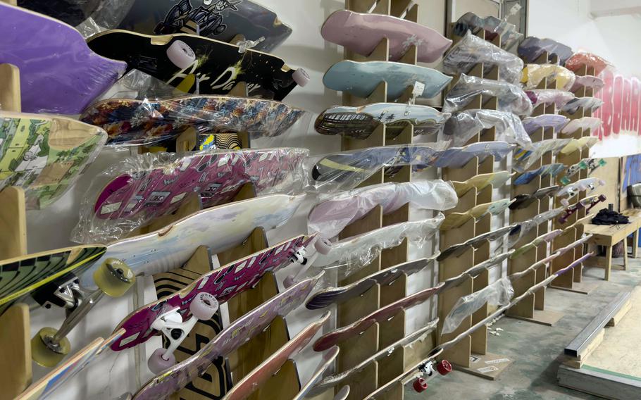 Boards hang from the walls like trophies at Stallboards skate shop and indoor skatepark in Suwon, South Korea.