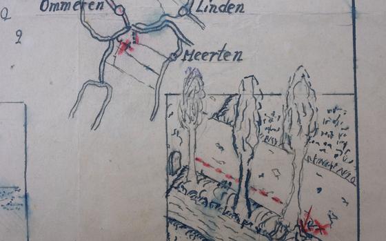 Detail of the map showing where the Nazi loot was reportedly buried in Ommeren, near Arnhem, is seen at the National Archive of the Netherlands in The Hague, Monday, Jan. 23, 2023. A hand-drawn map with a red letter X purportedly showing the location of a buried stash of precious jewellery looted by Nazis from a blown-up bank vault has sparked a modern-day treasure hunt in a tiny Dutch village. (AP Photo/Peter Dejong)