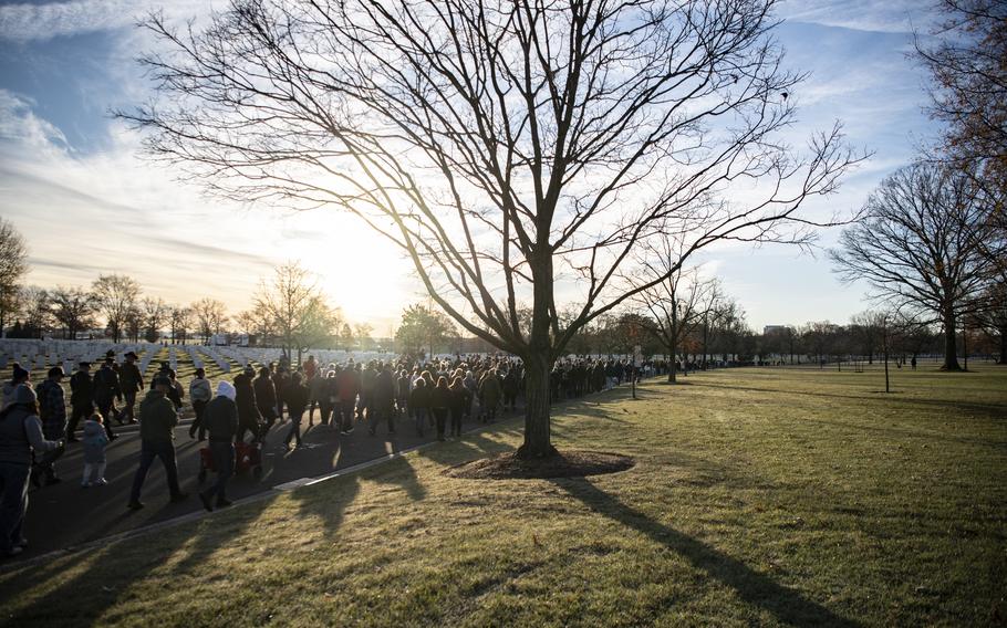 Volunteers participate in the 32nd Wreaths Across America Day at Arlington National Cemetery, Arlington, Va., Dec. 16, 2023. 