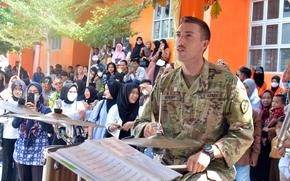 The U.S. Army's Tropic Lightning Band performs at Baturaja University in Indonesia, Thursday, Aug. 11, 2022.
