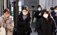 Tokyo reported a new one-day high of 14,086 coronavirus infections on Wednesday, Jan. 26, 2022.