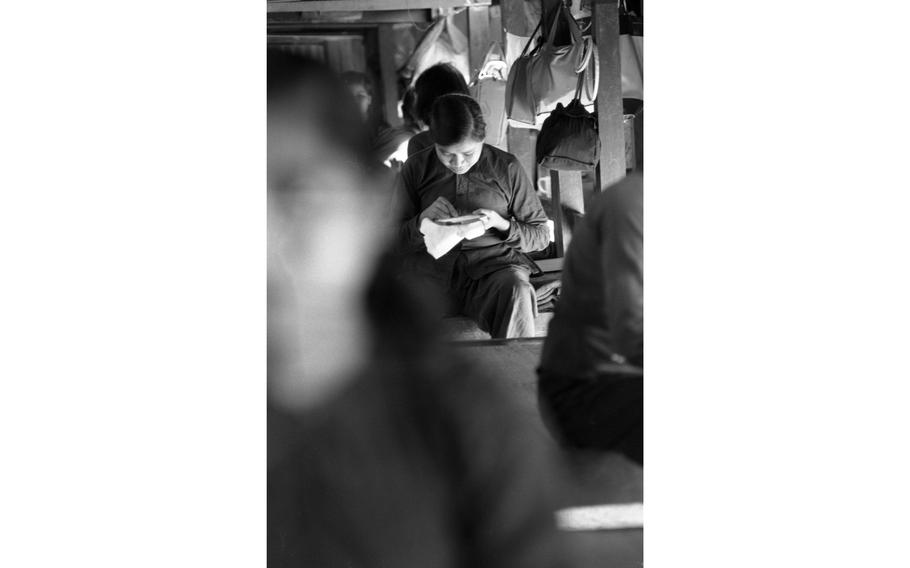 A female Viet Cong prisoner passes the time with some embroidery inside her quarters. Some 85 girls and women — 21 females were under the age of 18 — were interned in the Bien Hoa POW camp that opened in 1966 and housed a little less than 1,000 prisoners in 1968 — 200 of which were captured wearing North Vietnamese Army uniforms. 