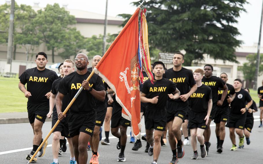 Soldiers celebrate the U.S. Army's 248th birthday with an early morning 3-mile run at Camp Zama, Japan, Wednesday, June 14, 2023.