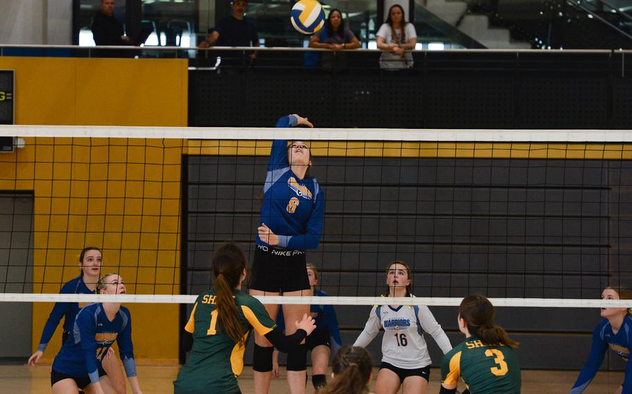 Wiesbaden Warrior Lorelei Kemmer jumps for the ball during the Division I game against SHAPE, Oct. 27, 2022, at Ramstein Air Base, Germany.