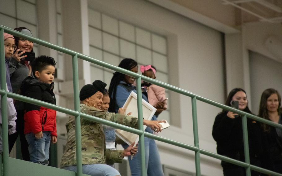 Family members welcome home soldiers from the 98th Support Maintenance Company (SMC), 17th Combat Sustainment Support Battalion, 11th Airborne Division, who returned to Joint Base Elmendorf-Richardson, Alaska, Thursday, March 28, 2024, after a nine-month deployment to Europe. 