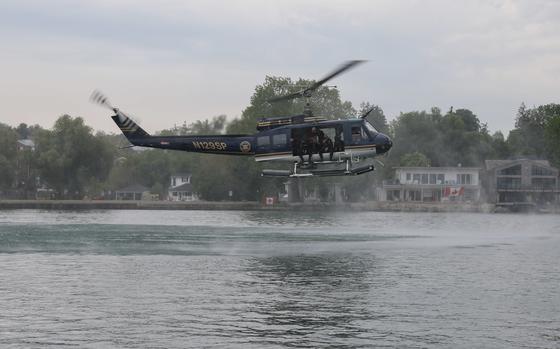 A helicopter over a river.