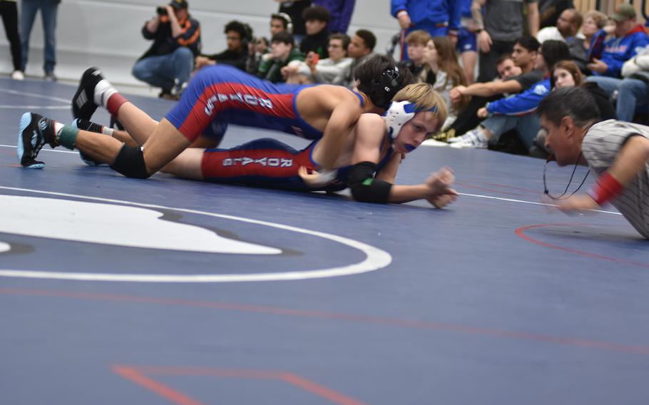 Ramstein’s Frank Lozano tries to flip his teammate, Jonah Hancock, in the 106-pound round-robin bracket at the DODEA-Europe wrestling sectional tournament at Ramstein High School, Germany, on Saturday, Feb. 3, 2024.