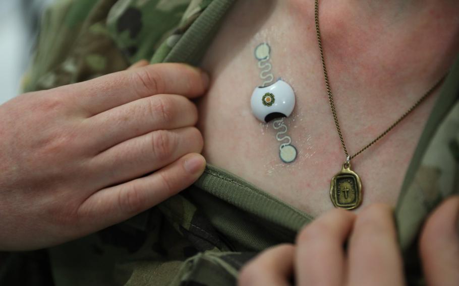 U.S. Army Reserve Capt. Kayla Corob, a medical surgical nurse, assigned to the 901st Medical Detachment, displays the Health Readiness and Performance System (HRAPS) in August 2022. The Army Reserve is testing the HRAPS as a potential new technology to aid in the readiness of Soldiers.