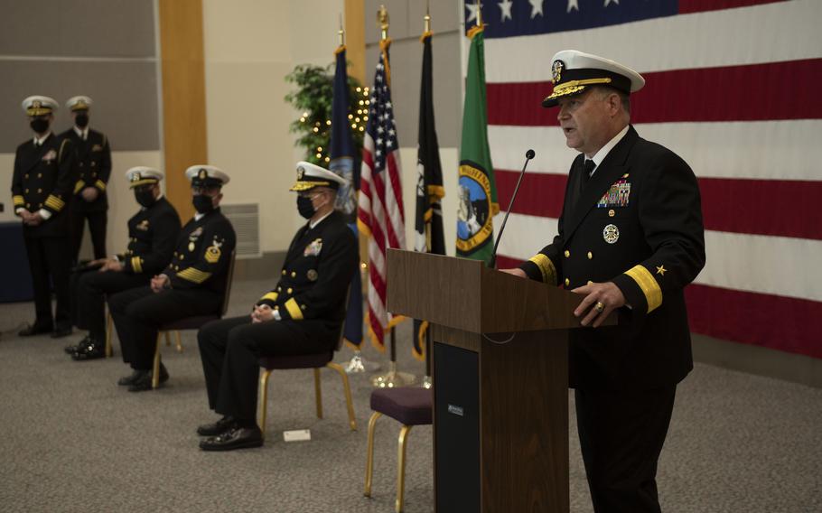 Rear Adm. Christopher Sweeney, incoming commander of Carrier Strike Group 11, speaks at a change of command at Naval Station Everett, Wash., April 30, 2021. Carrier Strike Group 11, the Nimitz Carrier Strike Group, recently returned from a more than 10 month deployment to the U.S. 5th and 7th Fleets.