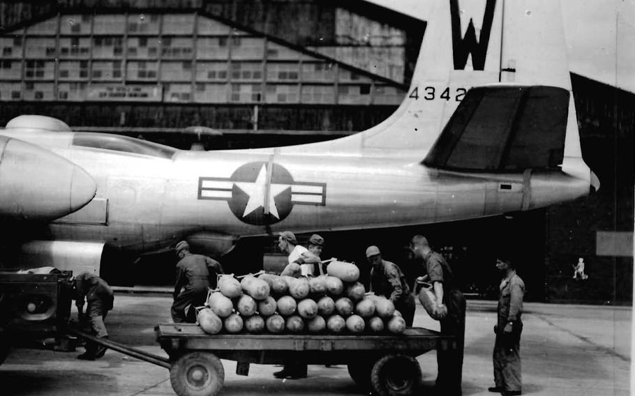 This undated photo shows bombs being loaded onto an aircraft at Yokota Air Base, Japan.