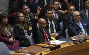 U.S. Deputy Ambassador Robert Wood votes against the resolution backing full U.N. membership for Palestine during a Security Council meeting on April 18, 2024.