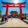 The morning sun peeks over the entrance to Fushimi Inari Shrine in Kyoto, Japan, May 28, 2025.
