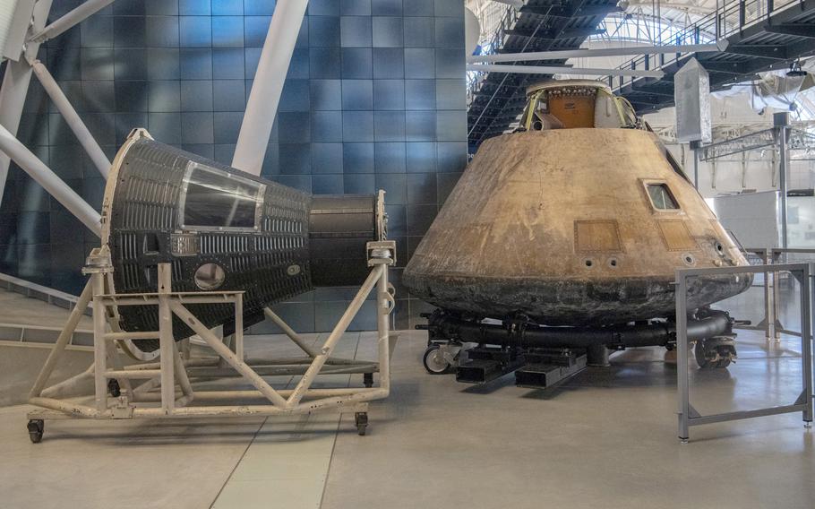 The Mercury MR-3 Freedom 7 capsule and the Apollo 11 command module, Columbia.