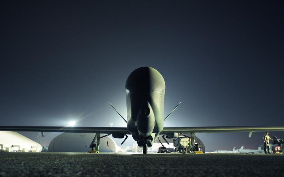 An RQ-4 Global Hawk assigned to the 99th Expeditionary Reconnaissance Squadron sits on the flight line at Al Dhafra Air Base, United Arab Emirates, May 7, 2021.