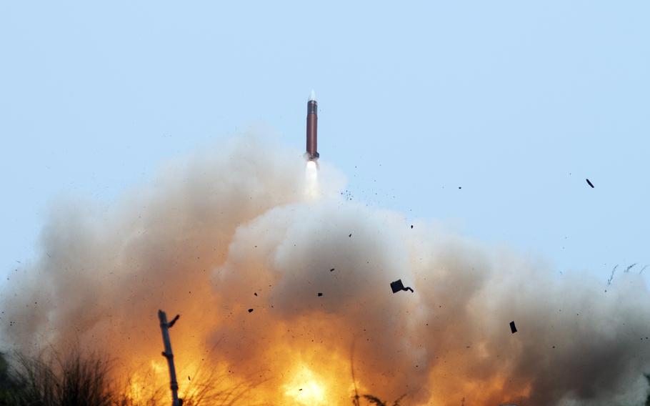 A Patriot missile is fired during a Balikatan drill at Naval Station Leovigildo Gantioqui in San Antonio, Philippines, Tuesday, April 25, 2023.