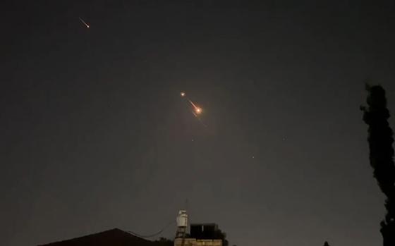 This video grab from AFPTV taken on April 14, 2024, shows explosions lighting up the Jerusalem sky during Iranian attack on Israel. Iran's Revolutionary Guards confirmed that a drone and missile attack was underway against Israel in retaliation for a deadly April 1 drone strike on its Damascus consulate. (AFPTV/AFP/Getty Images/TNS)